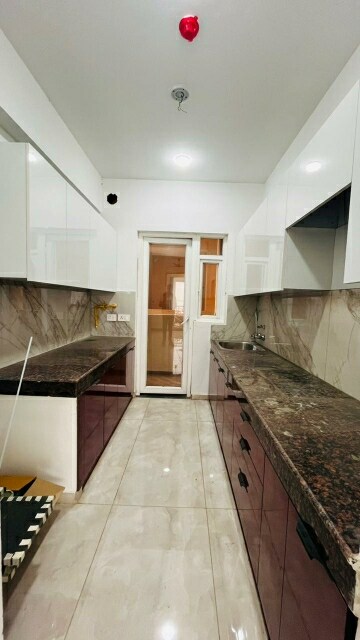 Kitchen in 3 BHK Apartment at ACE Parkway, Sector 150 – for Rent