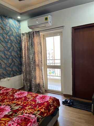 Bedroom in 2 BHK Apartment at Nimbus The Golden Palm, Sector 168 – for Rent