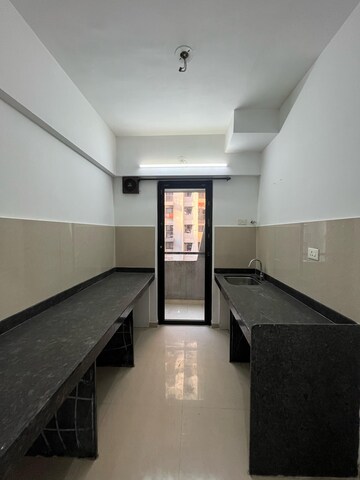 Kitchen in 1 BHK Apartment at Lodha Palava Eviva K To T Urbano A C F and I To T, Dombivli East – for Rent