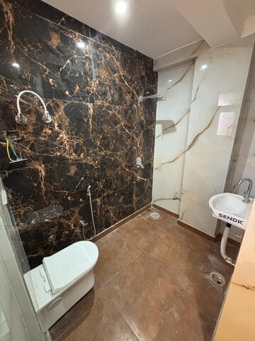 Bathroom in 4 BHK Apartment at Sector 14 Dwarka – for Sale