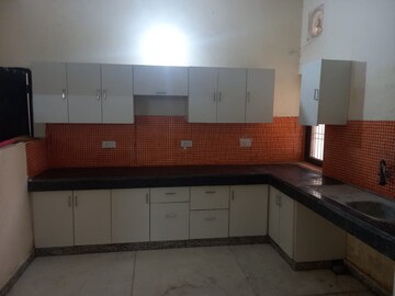 Kitchen in 2 BHK Apartment at Ajnara Le Garden, Sector 16b Greater Noida – for Rent