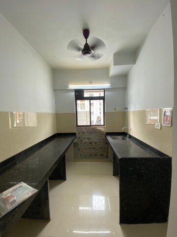 Kitchen in 1 BHK Apartment at Lodha Palava City Lakeshore Greens, Dombivli East – for Rent