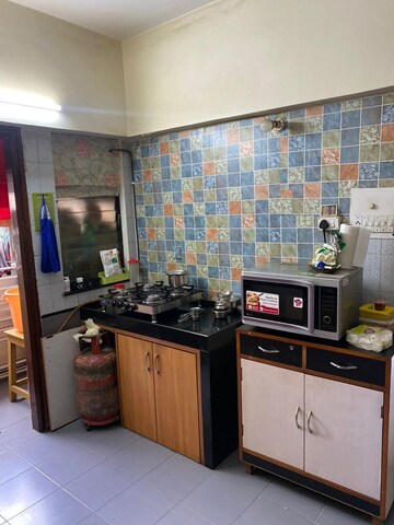 Kitchen in 2 BHK Apartment at NRI Complex Phase I, Seawoods Sector 58 – for Rent