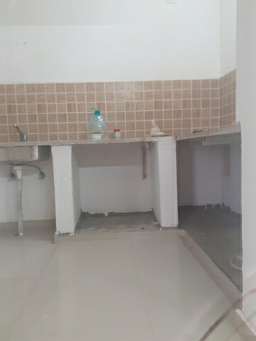 Kitchen in 2 BHK Apartment at Mahagun Mywoods, Sector 16c Greater Noida – for Rent