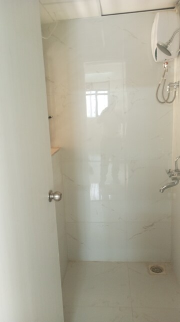 Bathroom in 1 BHK Apartment at Runwal Gardens, Dombivli East – for Rent