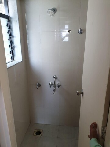 Bathroom in 2 BHK Apartment at Aggarwal Sumeet Elegance, Manpada – for Rent