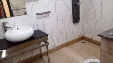 Bathroom in 4 BHK Builder Floor at Rajouri Garden – for Rent
