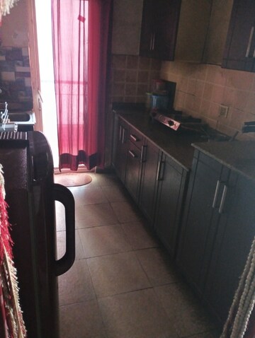 Kitchen in 2 BHK Apartment at Amrapali Empire, Sain Vihar – for Rent