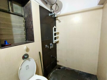 Bathroom in 1 BHK Apartment at Prathmesh Complex, Andheri West – for Rent