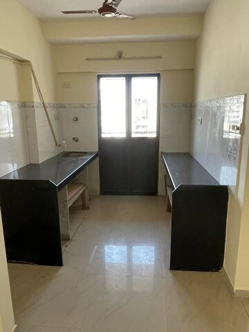 Kitchen in 2 BHK Apartment at Mohini Grace CHS, Andheri West – for Rent