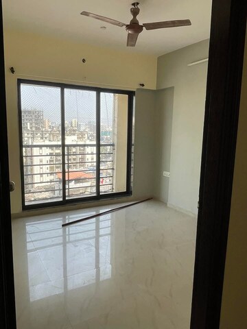 Room in 2 BHK Apartment at Mohini Grace CHS, Andheri West – for Rent