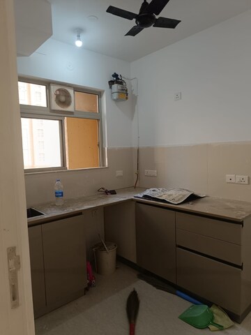 Kitchen in 1 BHK Apartment at Hiranandani Estate Solitaire C, Ghodbunder Road – for Rent