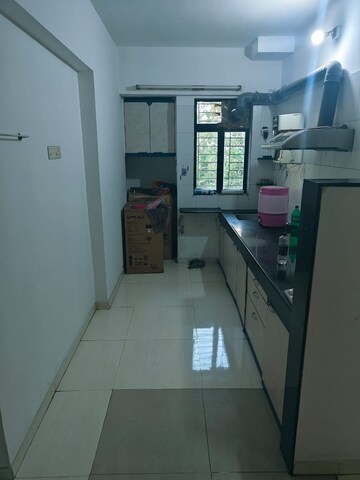 Kitchen in 2 BHK Apartment at Neelsidhi Neelkanth Valley, Dhokali – for Rent