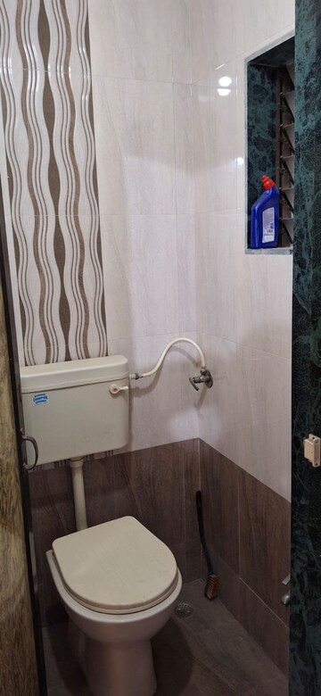 Bathroom in 2 BHK Apartment at Bimbisaar Nagar CHS, Goregaon East – for Rent