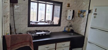 Kitchen in 2 BHK Apartment at Bimbisaar Nagar CHS, Goregaon East – for Rent