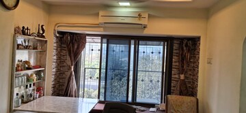 Room in 2 BHK Apartment at Bimbisaar Nagar CHS, Goregaon East – for Rent