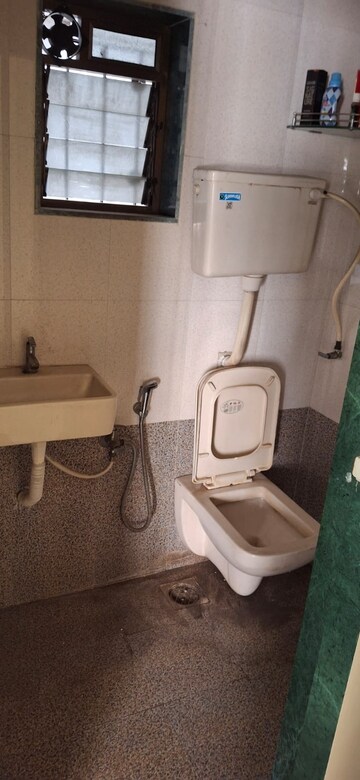 Bathroom in 2 BHK Apartment at Bimbisaar Nagar CHS, Goregaon East – for Rent