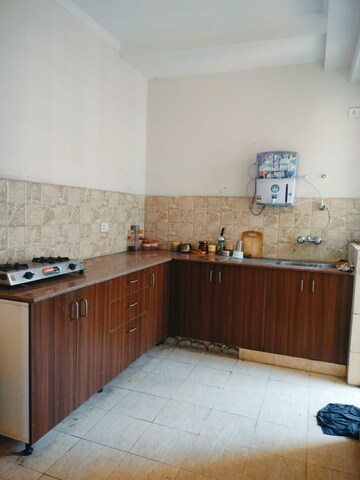 Kitchen in 3 BHK Apartment at Amrapali Golf Homes, Sector 4, Greater Noida – for Sale