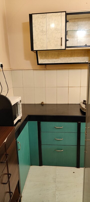 Kitchen in 1 BHK Apartment at Windsor Estate, Kalyani Nagar – for Rent