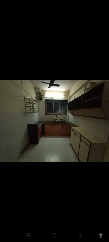 Kitchen in 2 BHK Apartment at Abhijeet CHS Dadar, Dadar West – for Rent