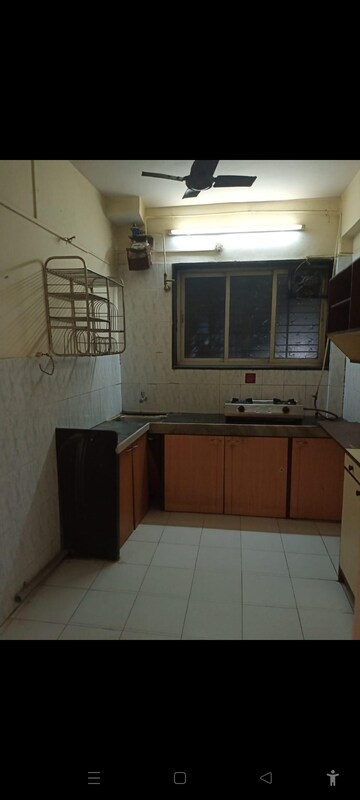 Kitchen in 2 BHK Apartment at Abhijeet CHS Dadar, Dadar West – for Rent