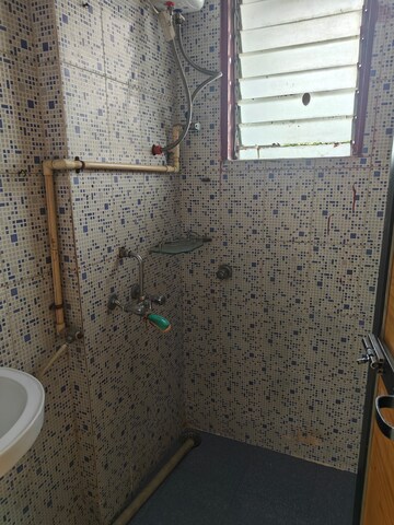 Bathroom in 1 BHK Apartment at Shubhkiran CHS, Sector 42 – for Rent