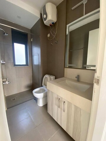 Bathroom in 3 BHK Apartment at Shapoorji Pallonji Joyville Phase 3, Sector 102 – for Rent