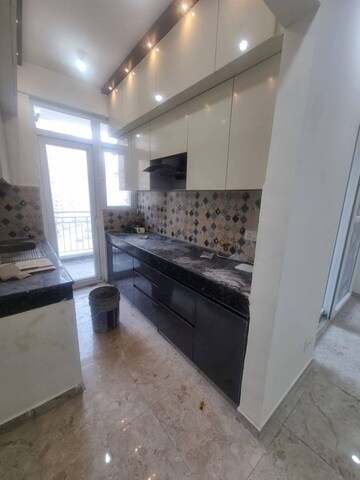 Kitchen in 2 BHK Apartment at Nimbus The Hyde park, Sector 78 – for Rent