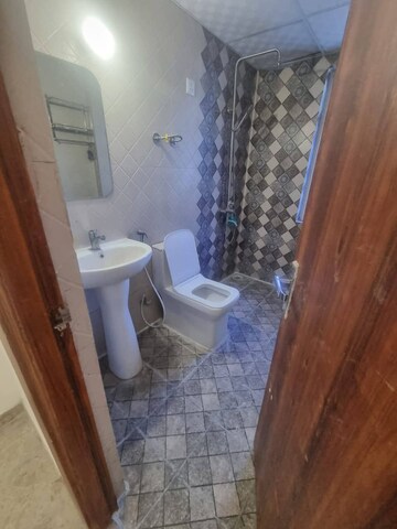 Bathroom in 2 BHK Apartment at Nimbus The Hyde park, Sector 78 – for Rent
