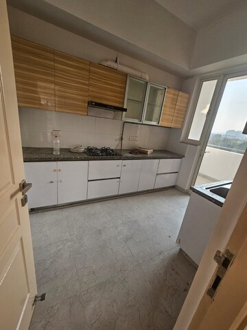 Kitchen in 3.5 BHK Apartment at M3M Merlin, Sector 67 – for Sale