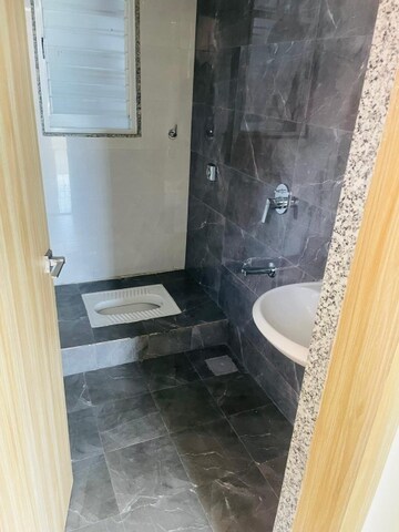 Bathroom in 2 BHK Apartment at Unique K Ville, Ravet – for Rent