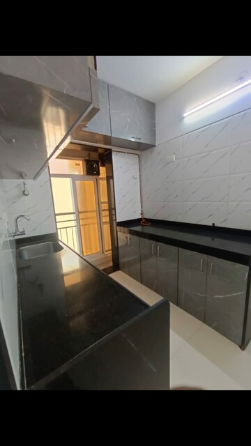 Kitchen in 2 BHK Apartment at Laxcon Plaza, Nerul – for Sale