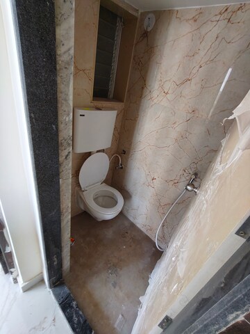Bathroom in 1 BHK Apartment at Shalibhadra CHS, Nalasopara West – for Rent