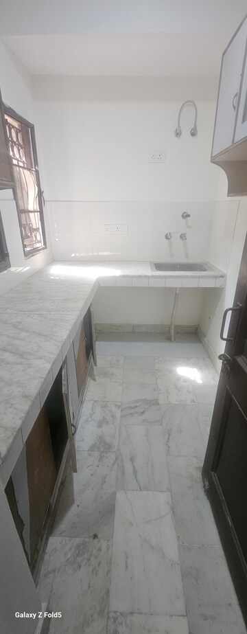 Kitchen in 2 BHK Apartment at Dwarka Complex, Sector 16 – for Sale