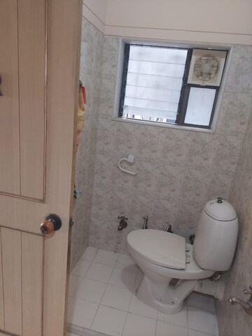 Bathroom in 2 BHK Apartment at Silver Sand CHS, Andheri West – for Rent