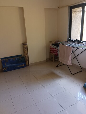 Bedroom in 2 BHK Apartment at Sonal Link Residency, Malad West – for Rent