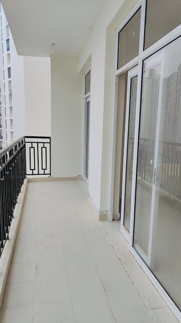 Building Lobby in 2 BHK Apartment at Ansal Paradise Crystal, Sushant Golf City – for Sale