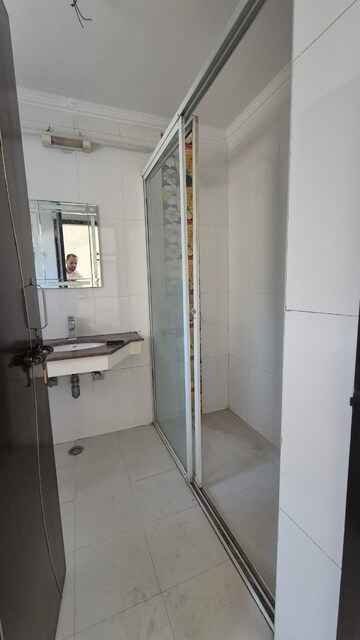 Bathroom in 3 BHK Apartment at Abhinandan CGHS, Sector 51 – for Rent