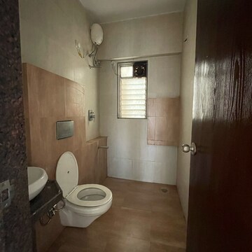 Bathroom in 2 BHK Apartment at Sadguru Complex I, Umershetpada – for Rent