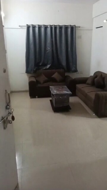 Living Room in 1 BHK Apartment at Adani Pratham, Near Nirma University On Sg Highway – for Rent