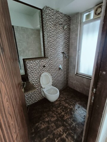 Bathroom in 2 BHK Apartment at Omkar Alta Monte, Malad East – for Rent