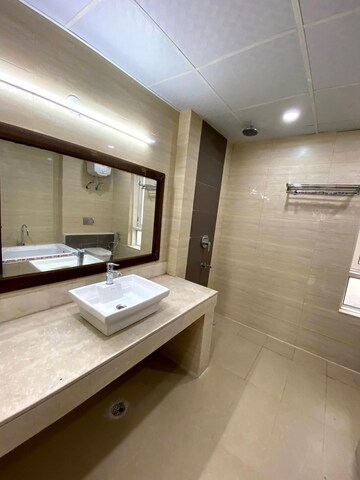 Kitchen in 4 BHK Apartment at Mahagun Mezzaria, Sector 78 – for Rent