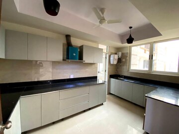 Kitchen in 4 BHK Apartment at Mahagun Mezzaria, Sector 78 – for Rent