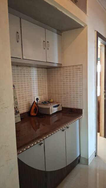 Kitchen in 3 BHK Apartment at Regency Estate, Dombivli East – for Sale