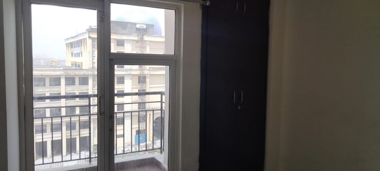 Room, aims-golf-city 2 Bedroom 950 Sq.Ft. Apartment In Sector 75 Noida 8360391