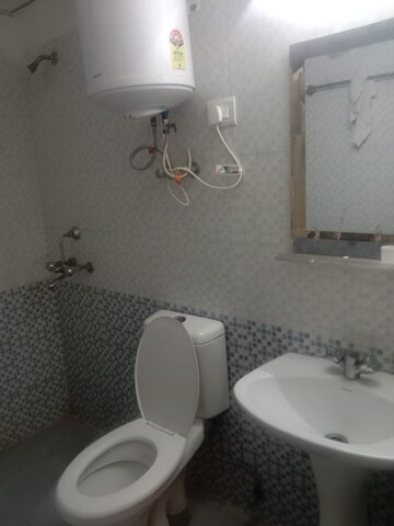 Bathroom in 2 BHK Apartment at Aims Golf City, Sector 75 – for Sale