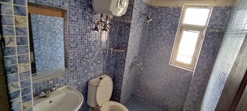 Bathroom in 3.5 BHK Apartment at Aims Golf City, Sector 75 – for Sale