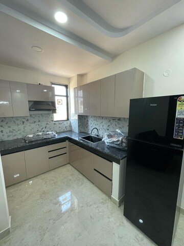 Kitchen in 2 BHK Builder Floor at Ansal Sushant Lok I, Sector 43 – for Rent