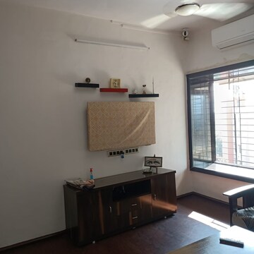 Living Room in 1 BHK Apartment at Dream Arihant Niwara Sky, Sion – for Sale
