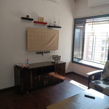 Living Room in 1 BHK Apartment at Dream Arihant Niwara Sky, Sion – for Sale